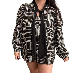 Eloquii black and white fun pattern blouse with bow